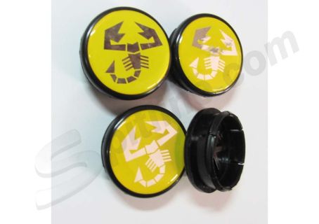 Serie 4 borchiette coprimozzo fondo giallo (diam. esterno mm 50 circa) con logo Abarth