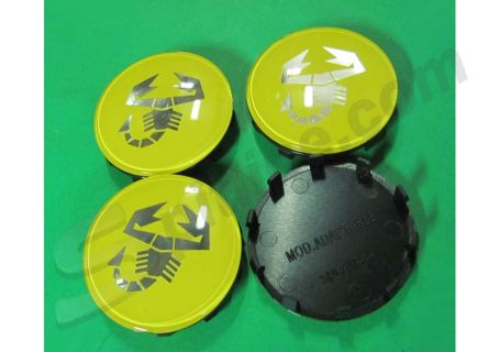 Serie 4 borchiette coprimozzo fondo giallo (diam. esterno mm 60 circa) con logo Abarth