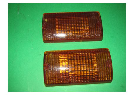 Coppia plastiche Stars arancio per fanali frecce anteriori Autobianchi A112 1^-2^-3^ serie ('69-'77) - Foro piccolo per vite in ferro