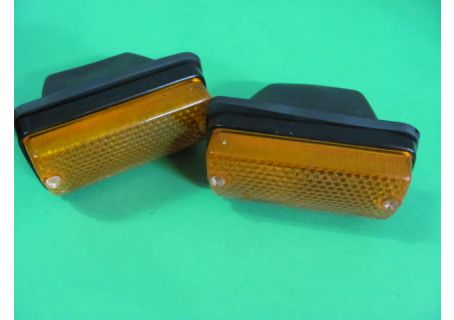 Coppia fanali anteriori (corpo in plastica nera) con cuffia di protezione Autobianchi A112, A112 Abarth 1^, 2^, 3^ serie ('69-'77)
