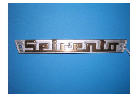 Fregio con scritta Seicento in plastica per Fiat 600