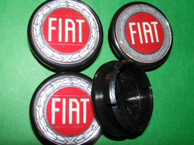 N°4 Borchiette coprimozzo logo FIAT (per cerchi con foro diam. 43 circa)