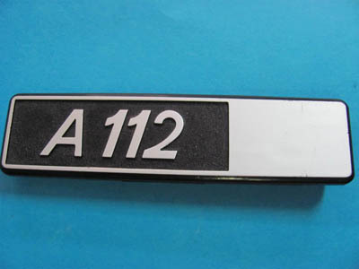 Scritta in plastica posteriore destra Autobianchi A 112 (fondo nero ruvido)