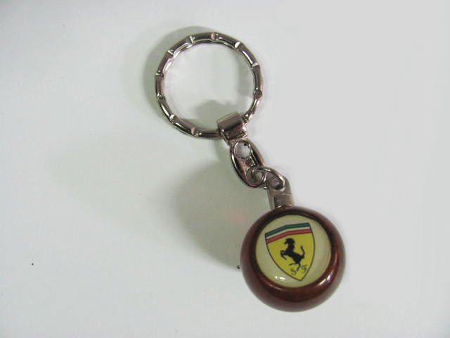 Portachiavi sferico color ambra logo Ferrari